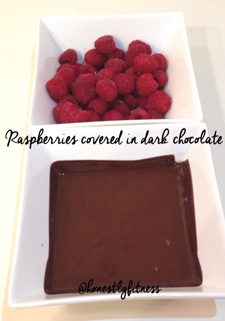 raspberries covered in dark chocolate by honestly fitness